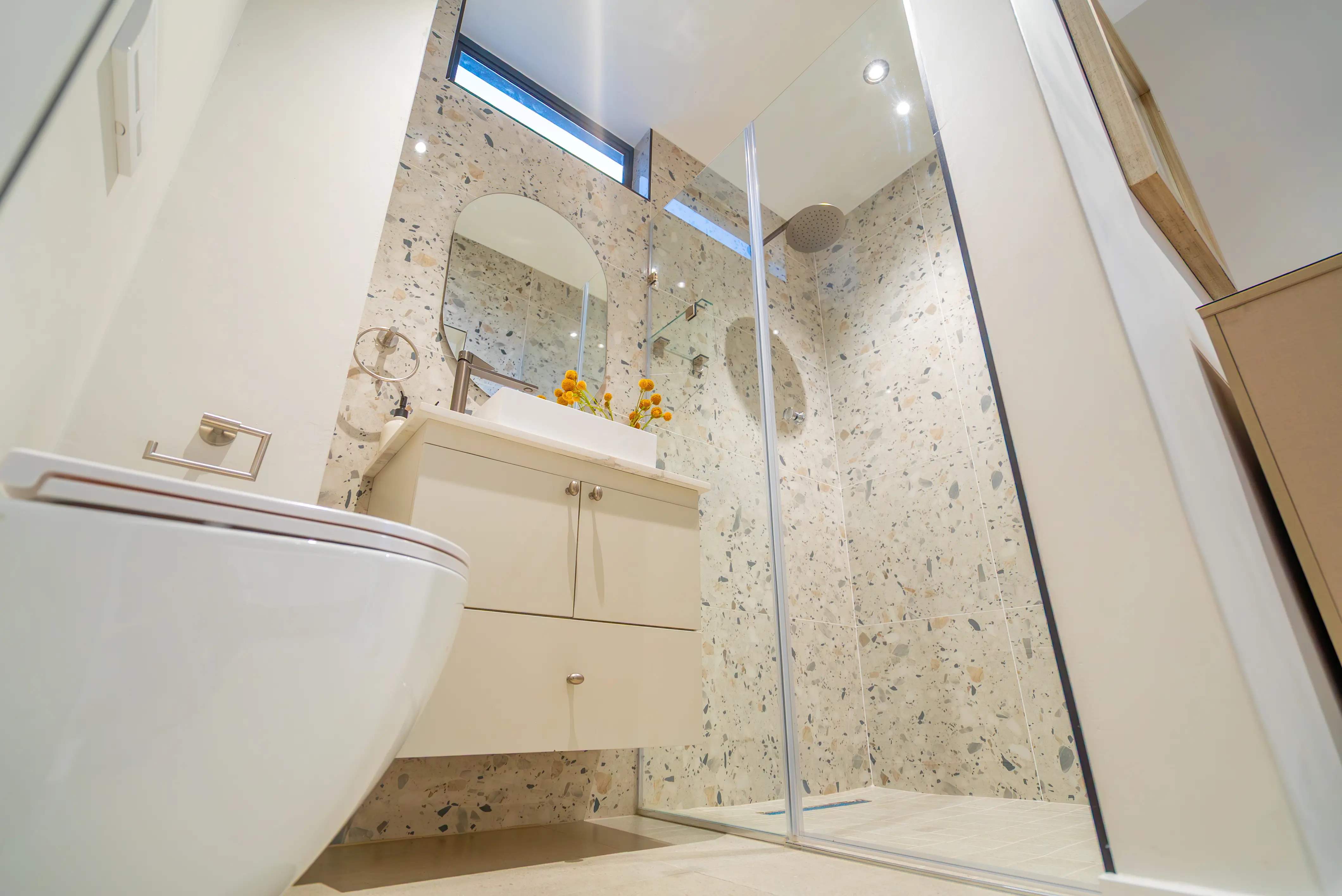 Terrazzo Tiled Bathroom Vanity with Circular Mirror